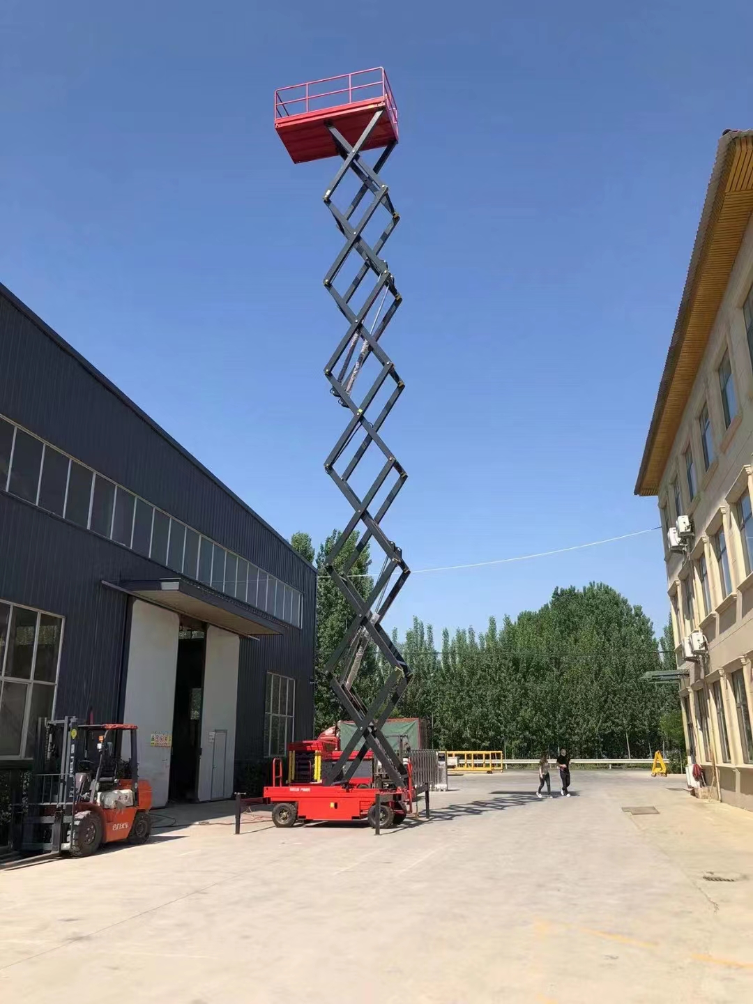 Plataforma elevadora de tijeras de 18 metros para caminar auxiliar 